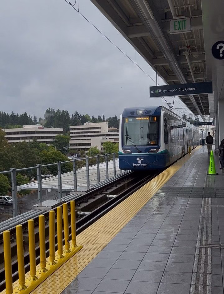 A Seattle Light Rail Guide shows a Sound Transit train stopped at a platform labeled "Lynnwood City Center."