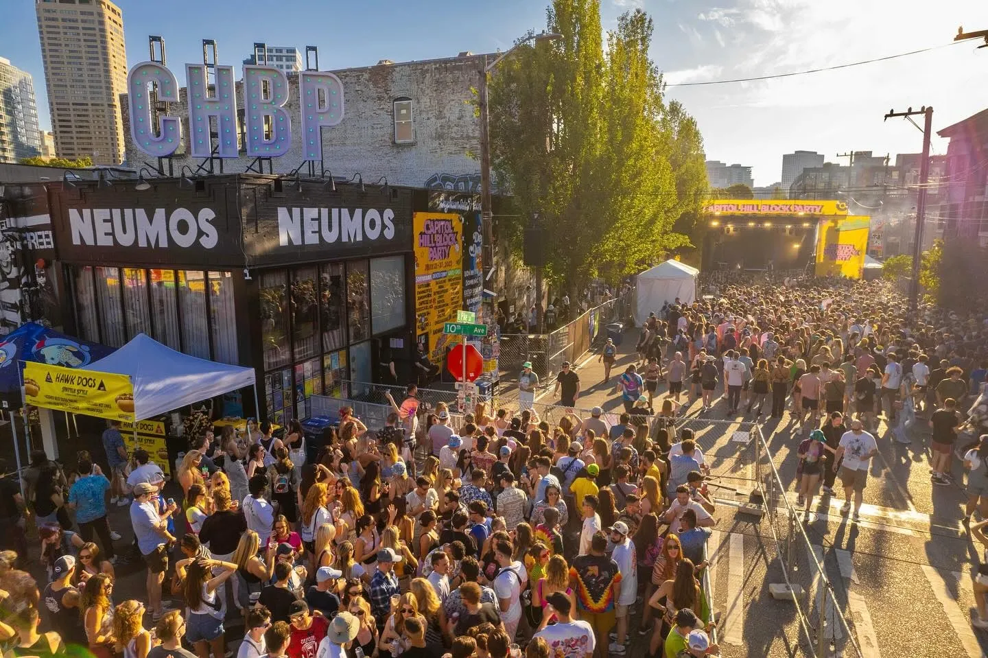 Crowds gather outside Neumos for a music festival in the lively heart of Capitol Hill Seattle.